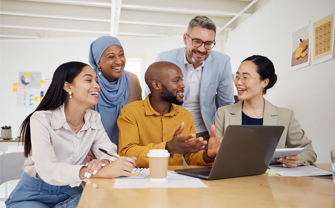 Business team working together using Dragonfly’s collaborative information management system for centralized data sharing.